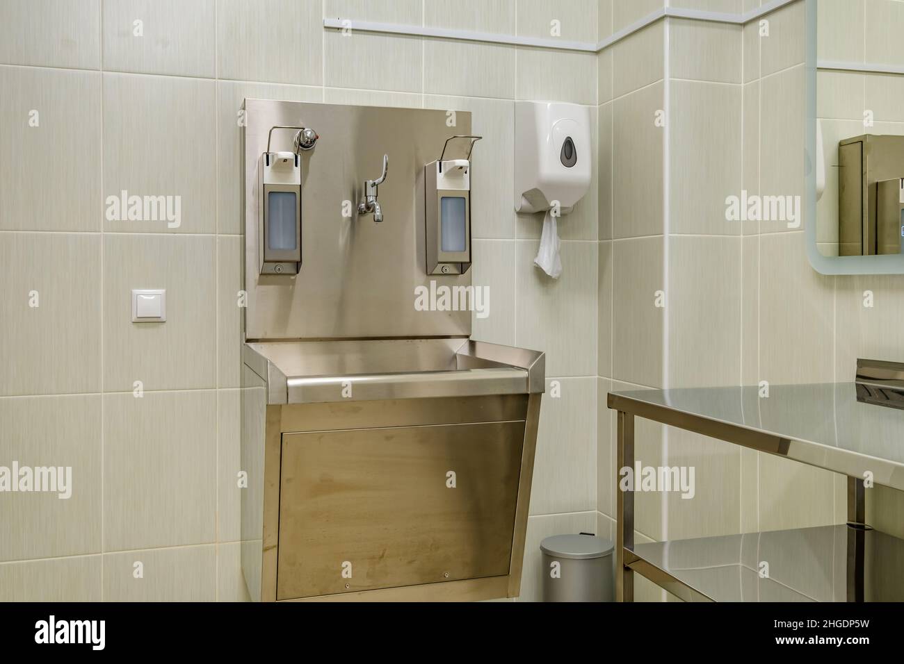 elbow soap and antiseptic dispenser or sanitizer wall mounted for hand