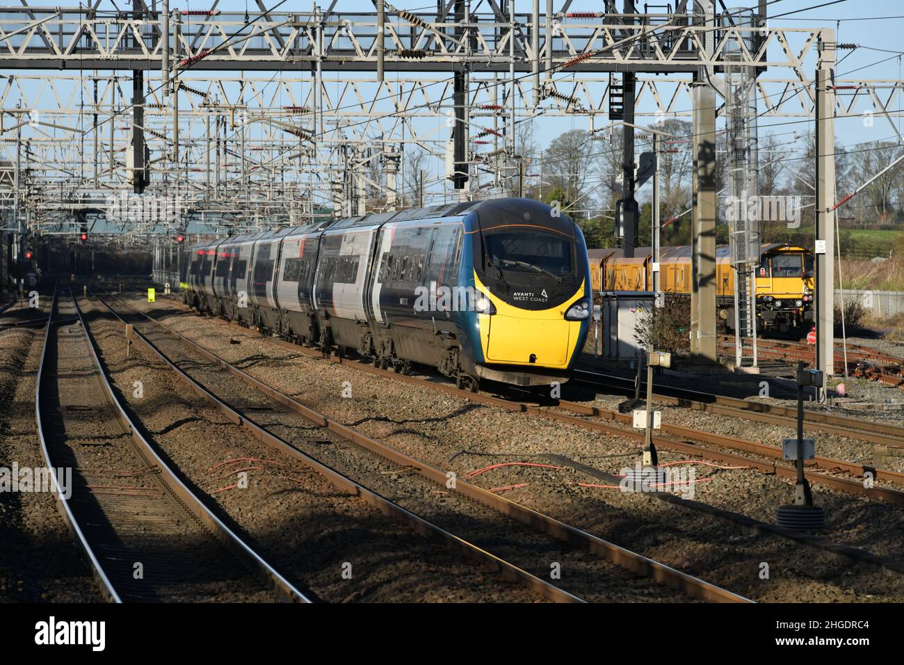 Avanti West Coast Pendolino 390046 working service 1A25 the 10:47 Liverpool Lime Street to London Euston approaching Lichfield TV on 20 Jan. 2022 Stock Photo