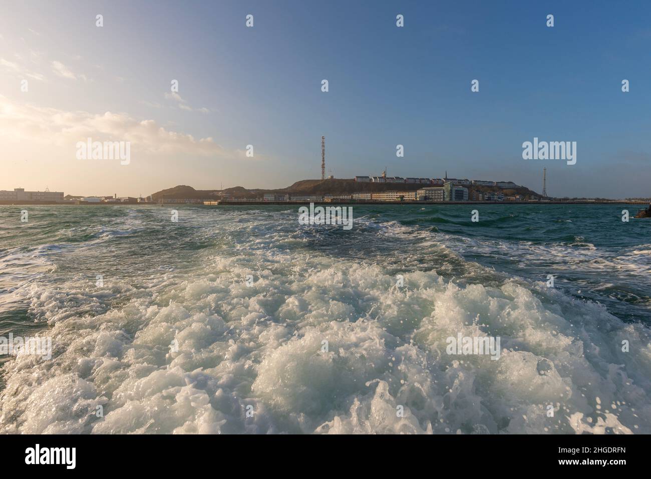 The small ferry boat going in stormy weather from the main island Heligoland to the Dune, district Pinneberg, Schleswig-Holstein, Northern Germany Stock Photo