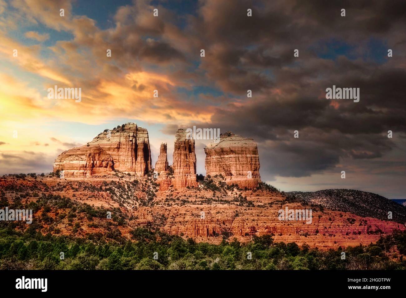 Cathedral Rock stands high on the horizon above the town of Sedona, Arizona. Stock Photo