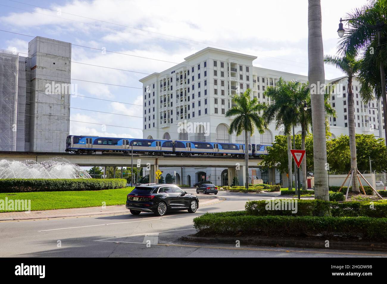 Miami-Dade County Metrorail, public transportation, train on elevated track moving through the Coral Gables area. Stock Photo