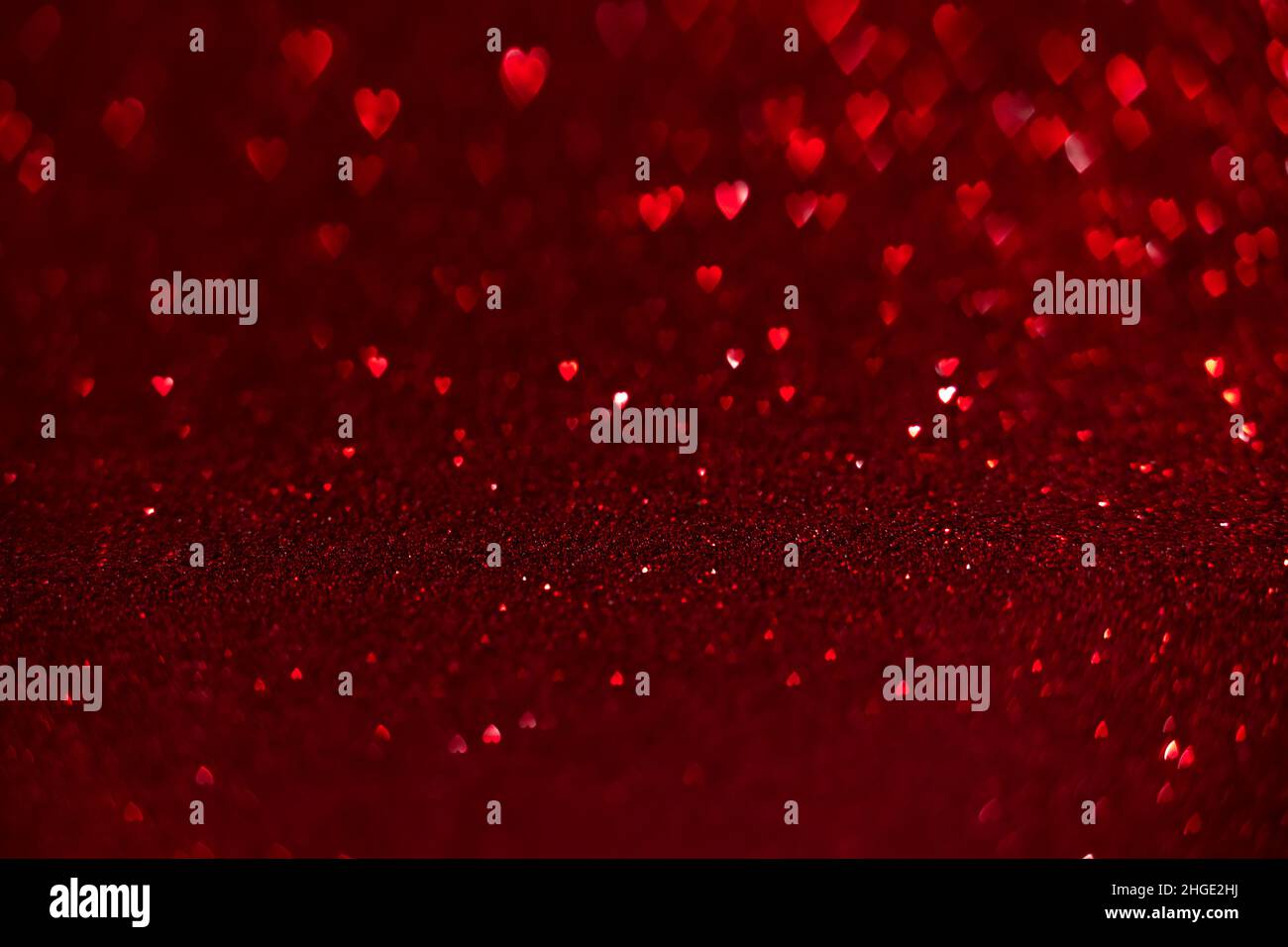 Red hearts, sparkling glitter bokeh background, valentines day abstract ...