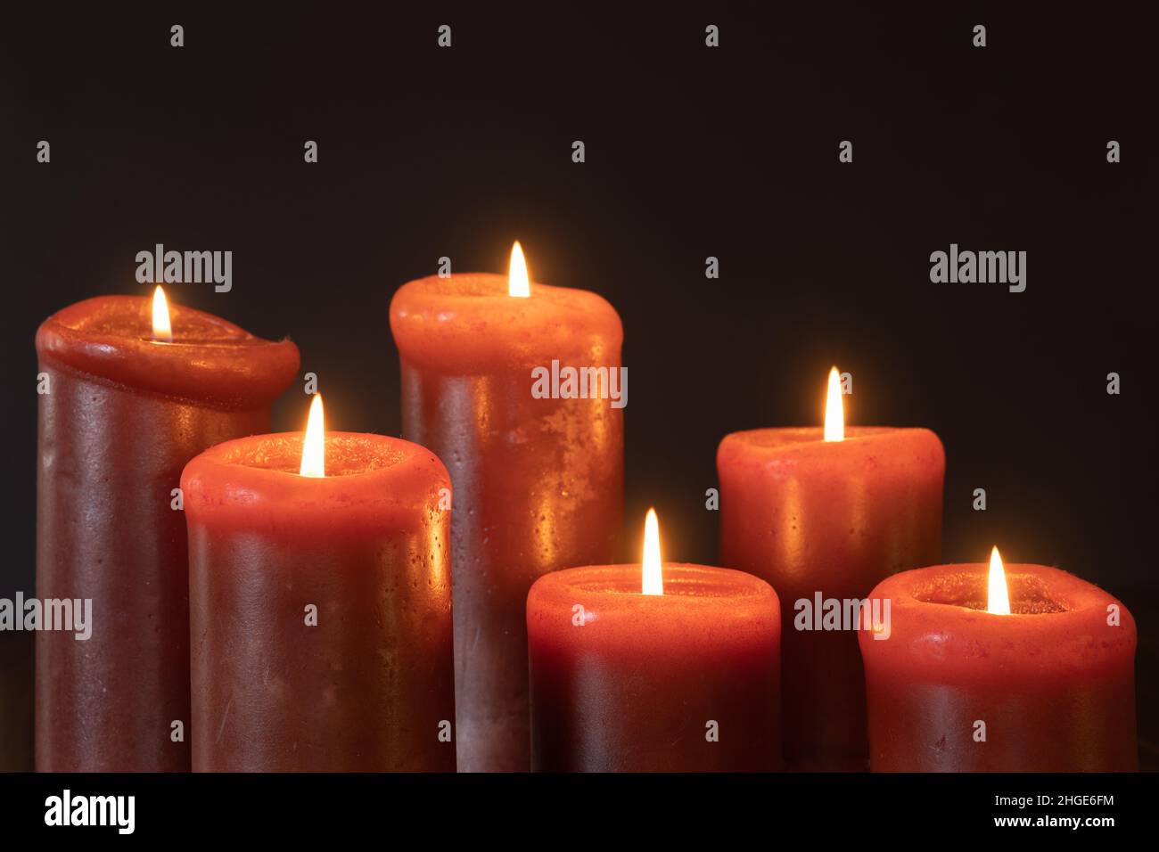 Lit candle in dark hires stock photography and images Alamy