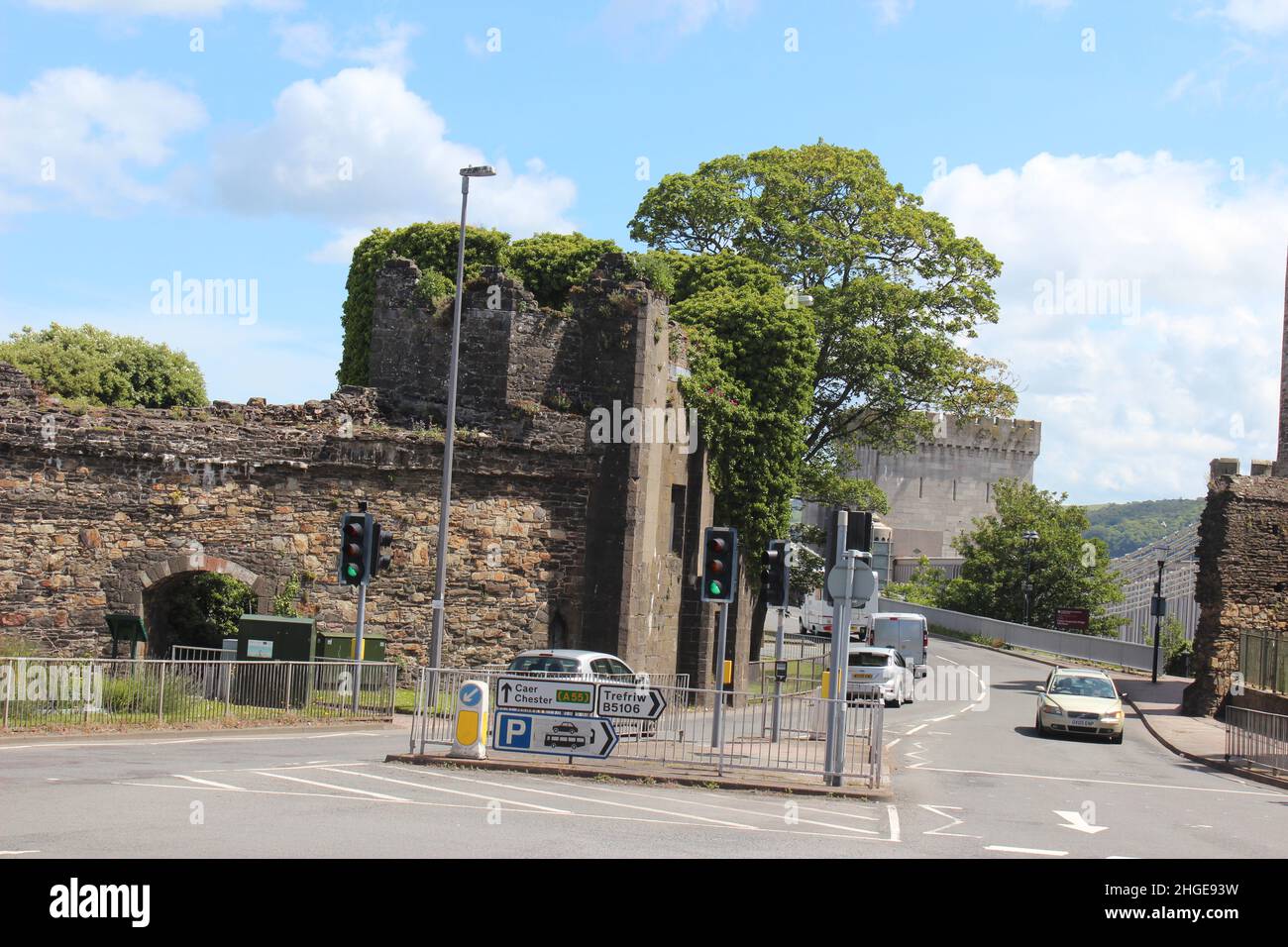 Conwy is a walled market town  and community in Conwy county borough on the north coast of Wales Stock Photo