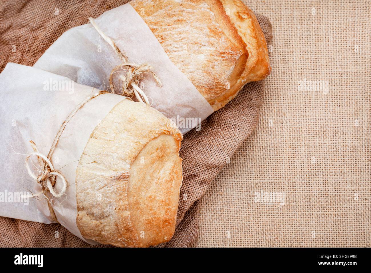ciabatta breads on rustic surface with copy space Stock Photo Alamy