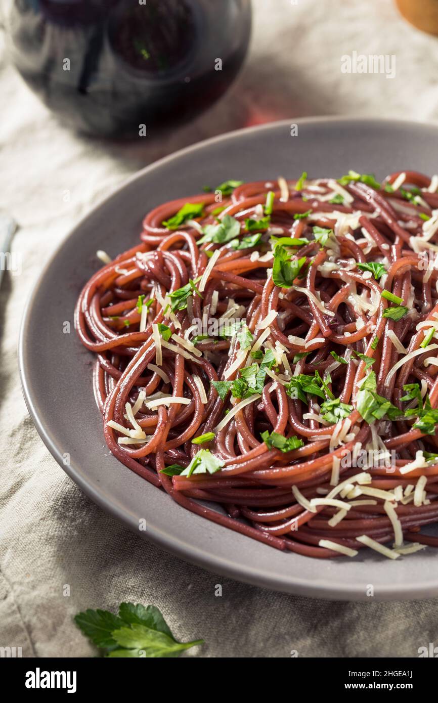 Homemade Red Wine Spaghetti with Cheese and Parsley Stock Photo Alamy