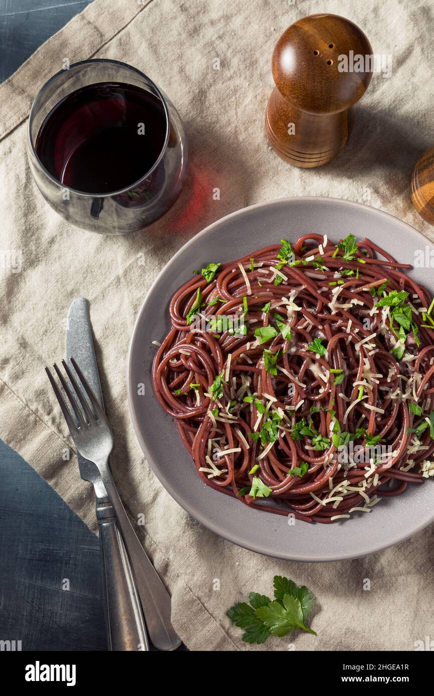 Homemade Red Wine Spaghetti with Cheese and Parsley Stock Photo Alamy