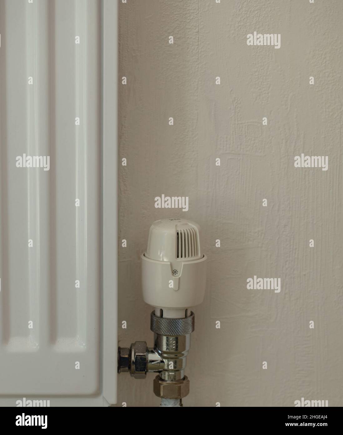 Close up of radiator and thermostat of a gas central heating system Stock Photo Alamy