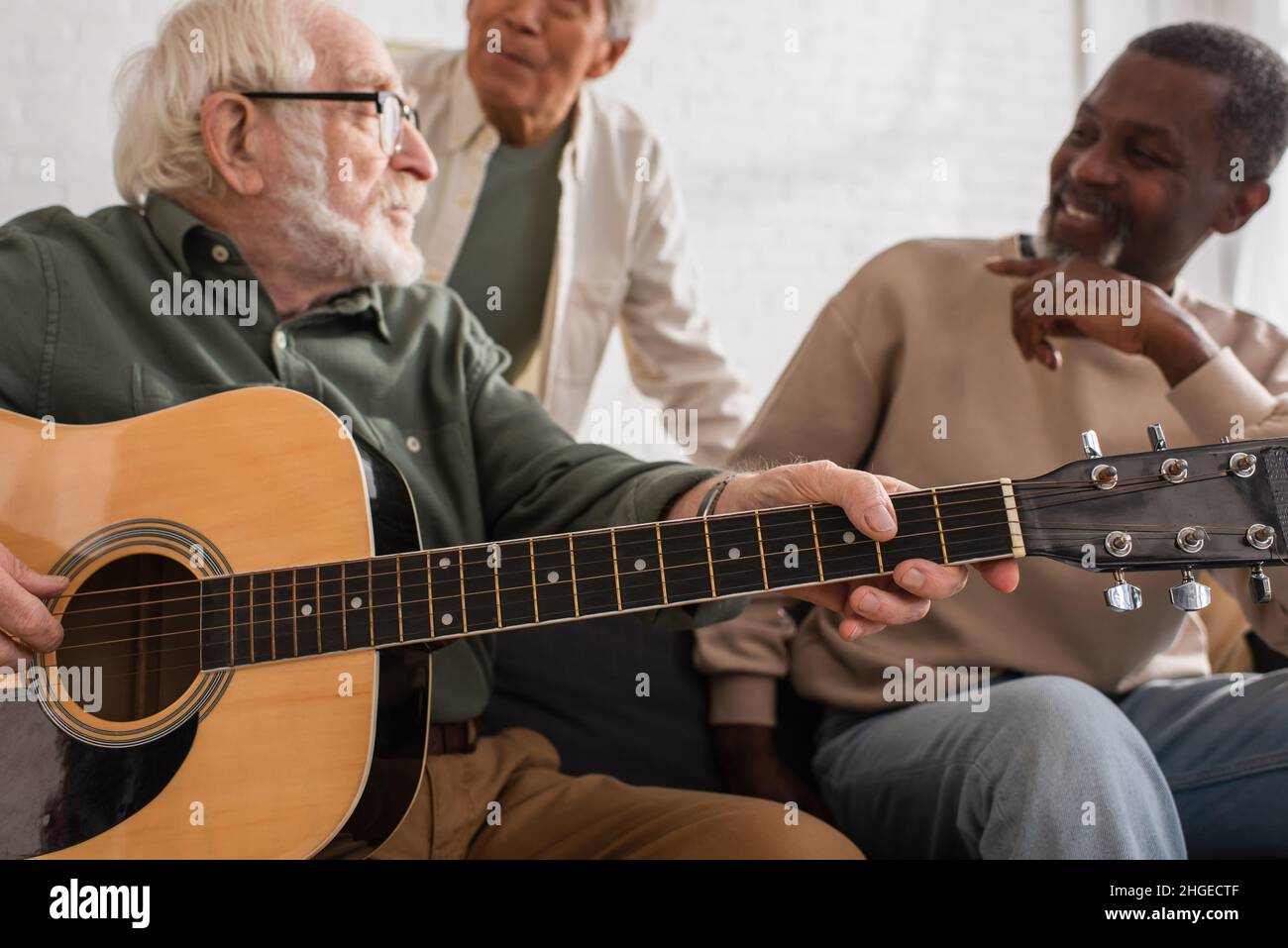 Elderly multiethnic men playing hi-res stock photography and images - Alamy
