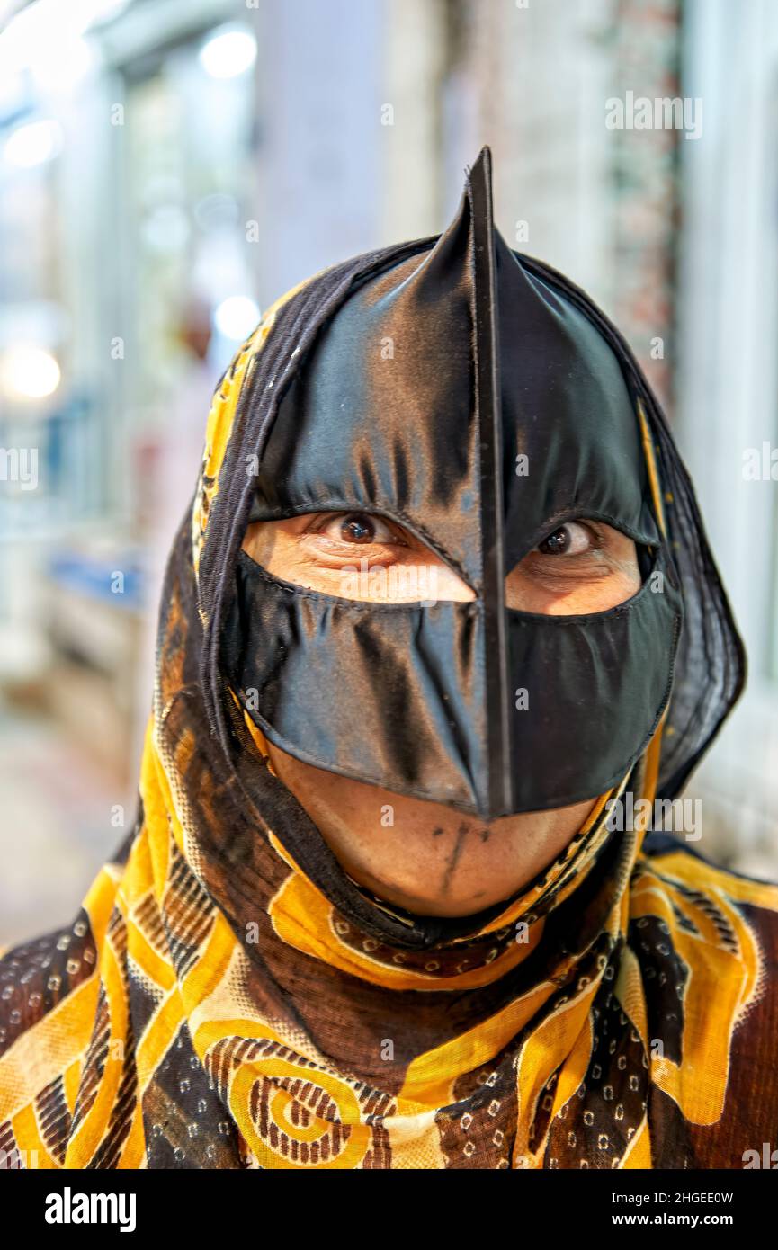 Oman. Muscat. Woman with traditional omani mask Stock Photo - Alamy