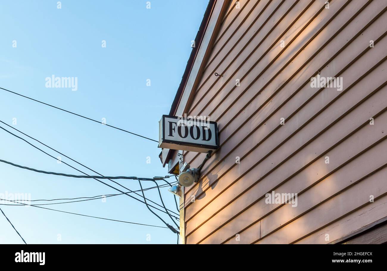 'Food' sign on side of building in New Orleans, LA, USA Stock Photo