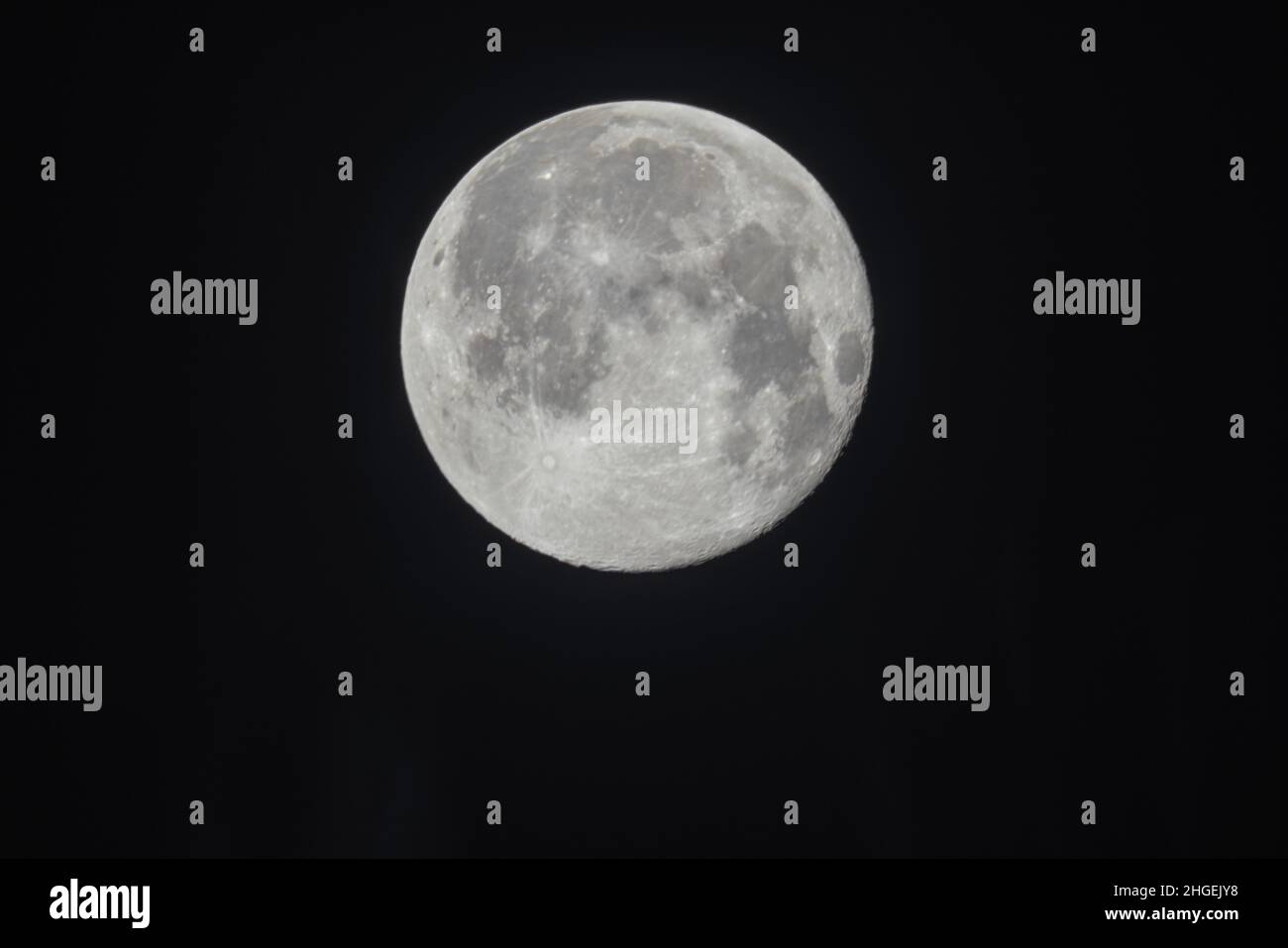 A full moon on a dark sky Stock Photo