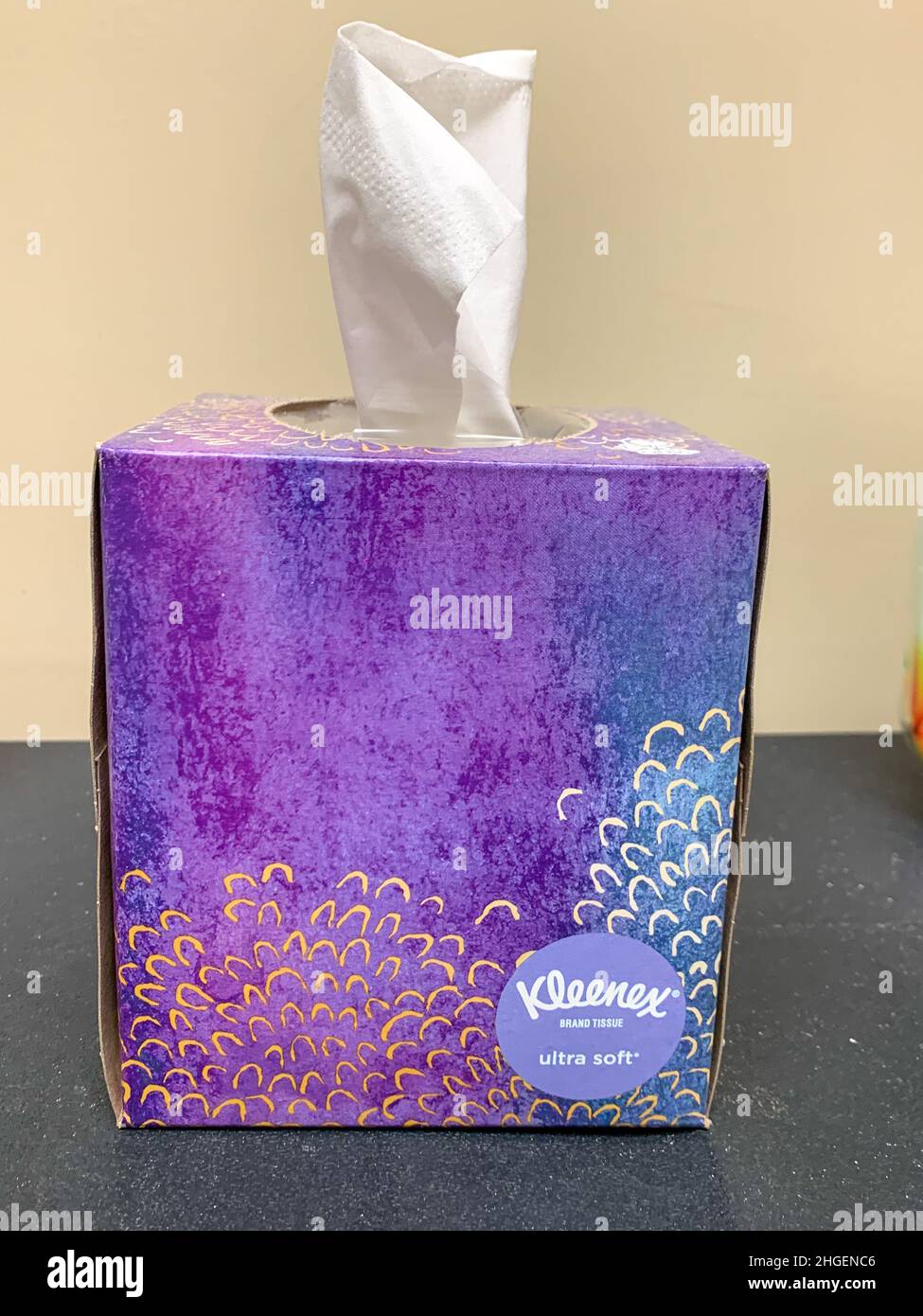 Purple Box of White Kleenex tissues side view . High quality photo Stock Photo