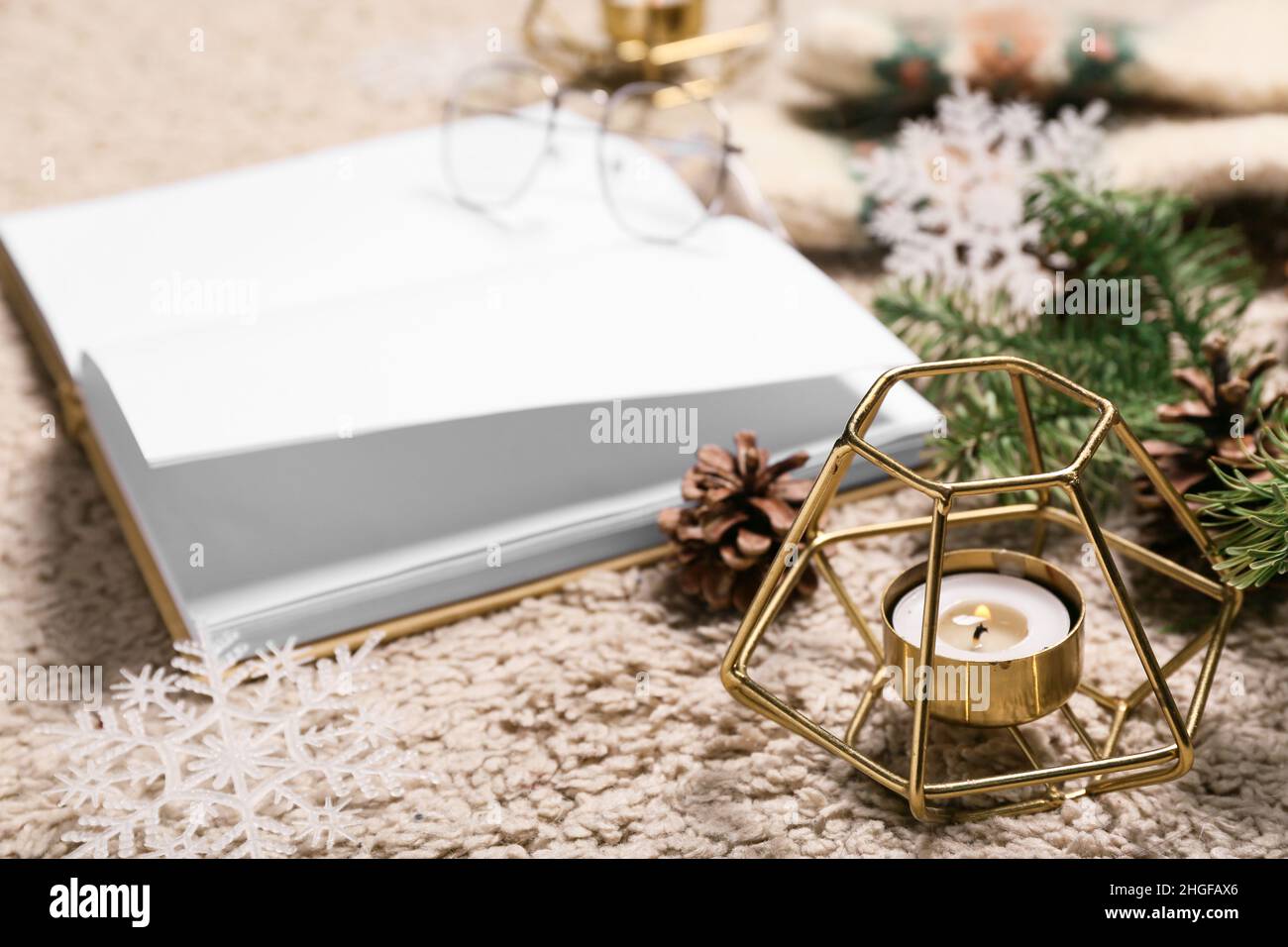 Burning candle opened book hires stock photography and images Alamy