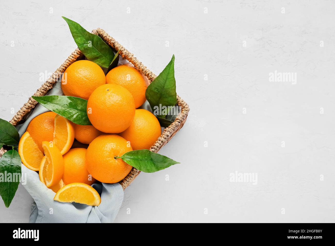 Box with fresh juicy oranges on white background Stock Photo - Alamy