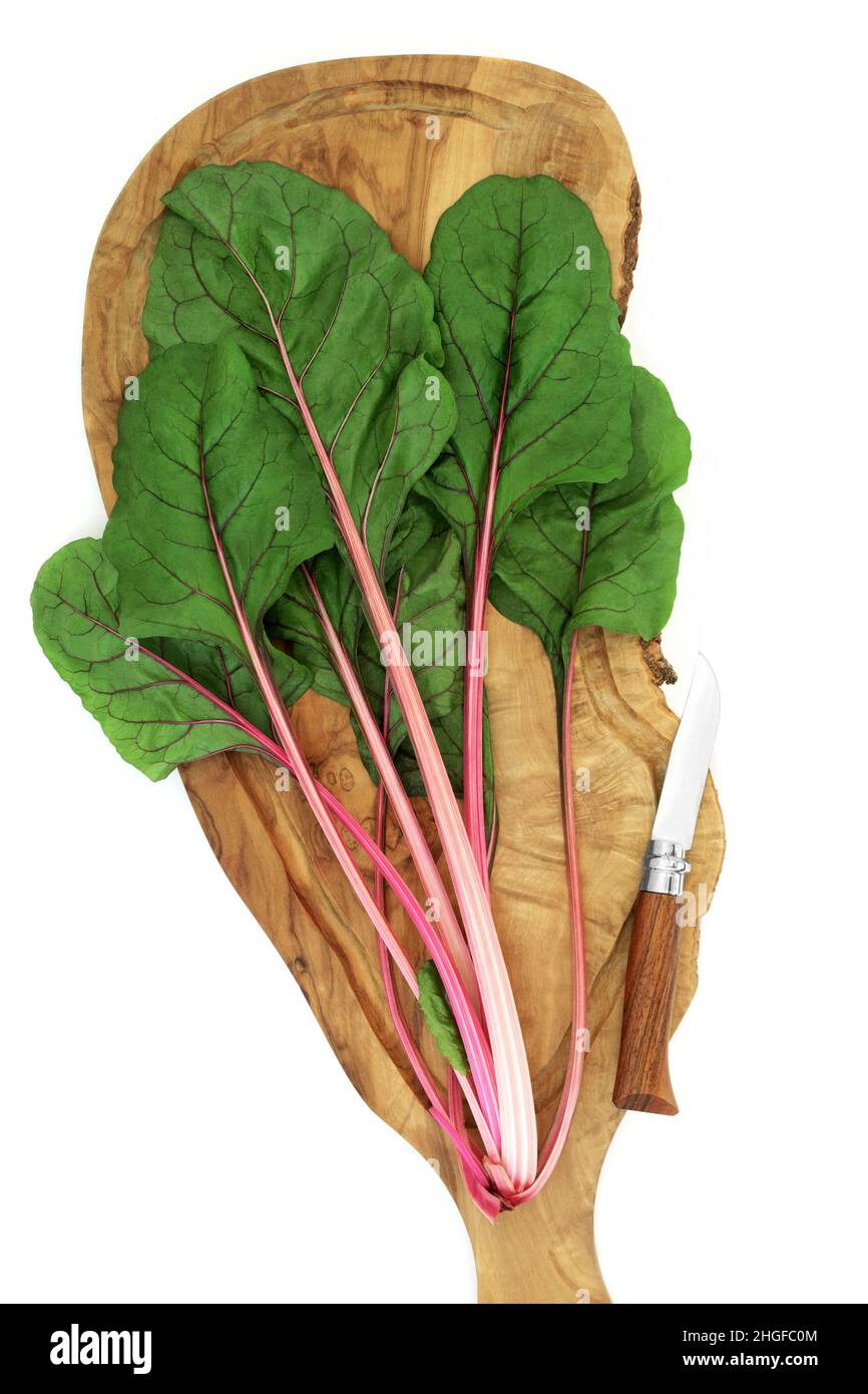 Ruby Vegetable Swiss chard ruby red leafy green vegetable preparation on an olive wood ...