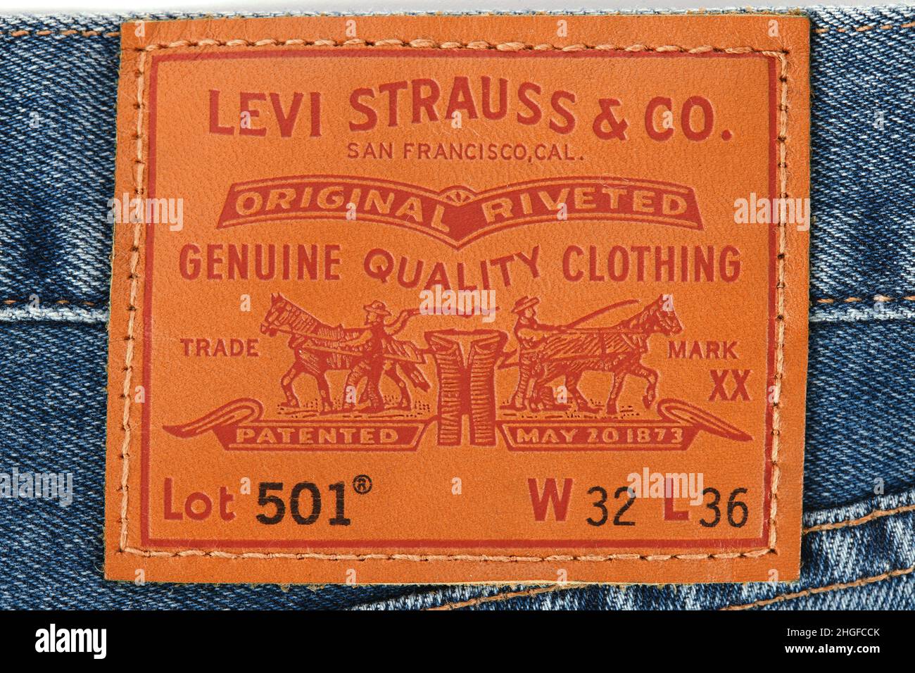 Close up of the details of new LEVI'S 501 Jeans. Seams and denim texture close-up. Classic jeans model. LEVI'S is a brand name of Levi Strauss and Co, Stock Photo