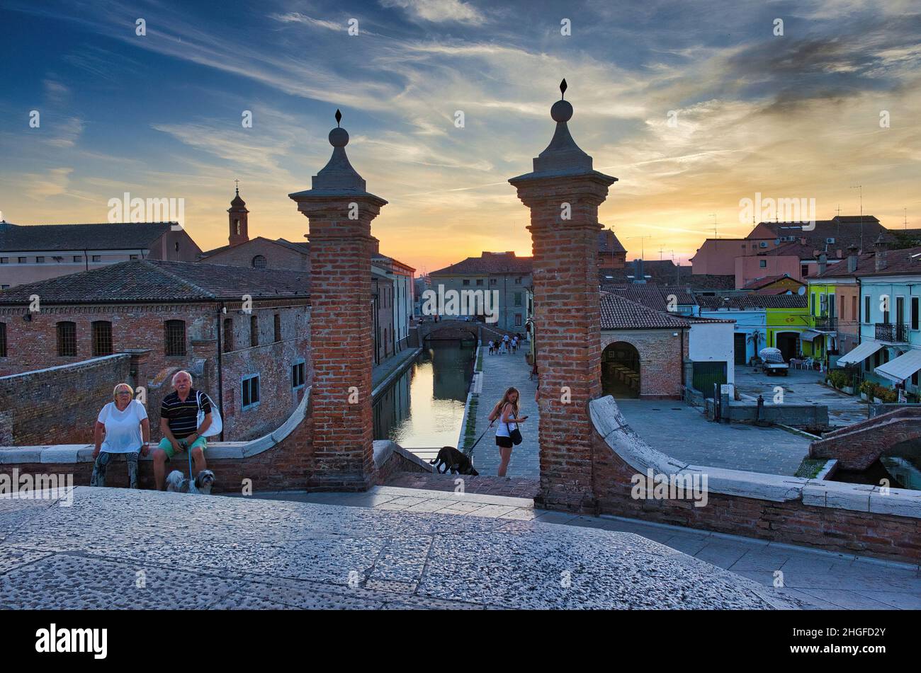 Canal at sunset seen from the bridge of Saint Peter, Comacchio, Italy, Ferrara Stock Photo