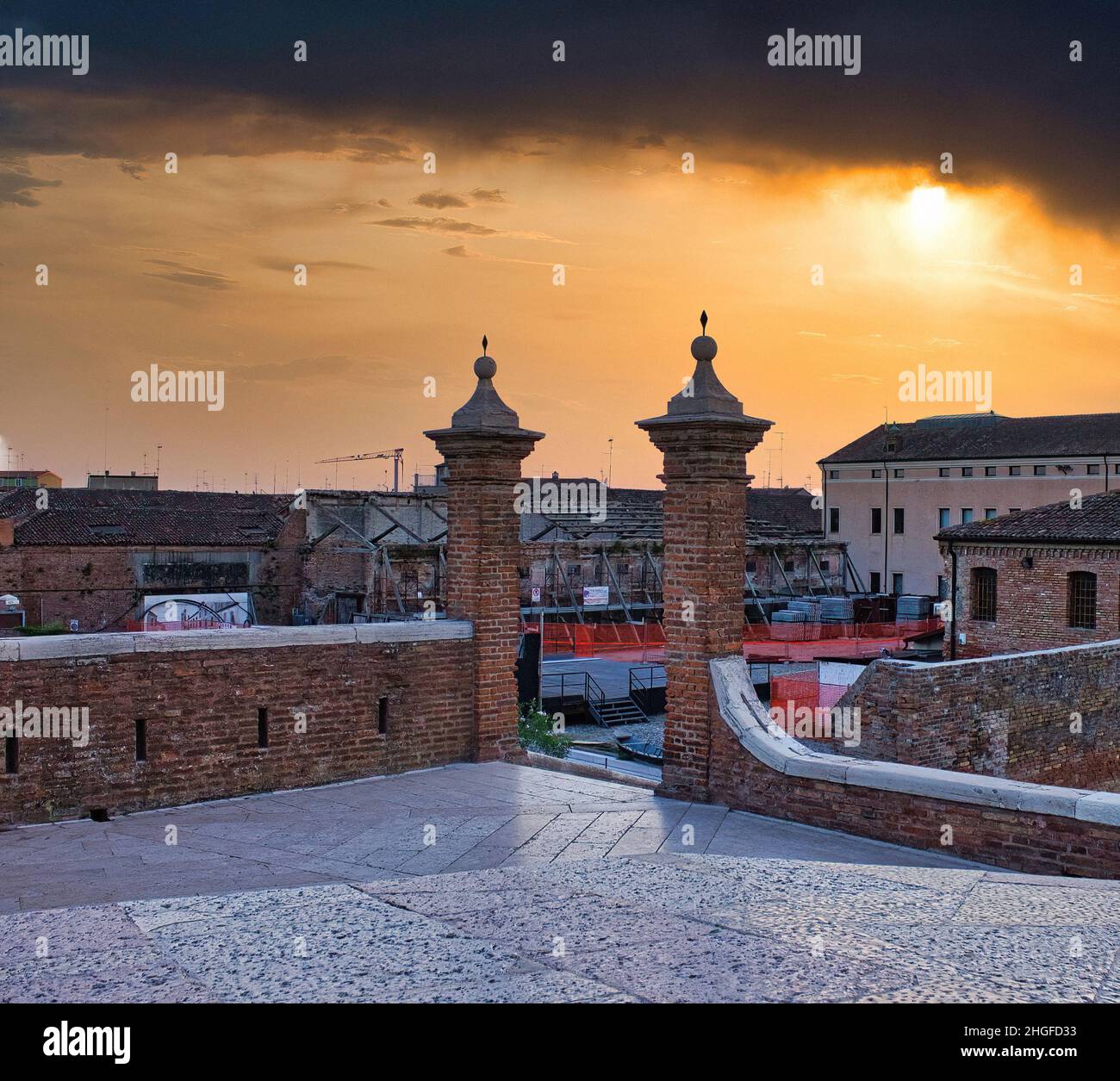 Canal at sunset seen from the bridge of Saint Peter, Comacchio, Italy, Ferrara Stock Photo