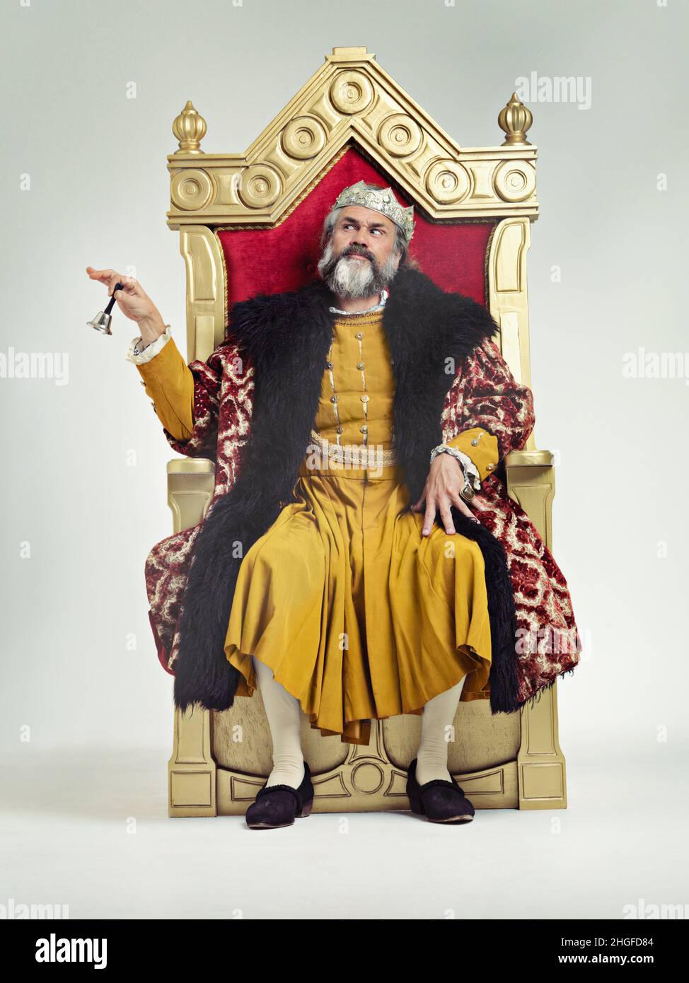 Man king sitting on chair hires stock photography and images Alamy
