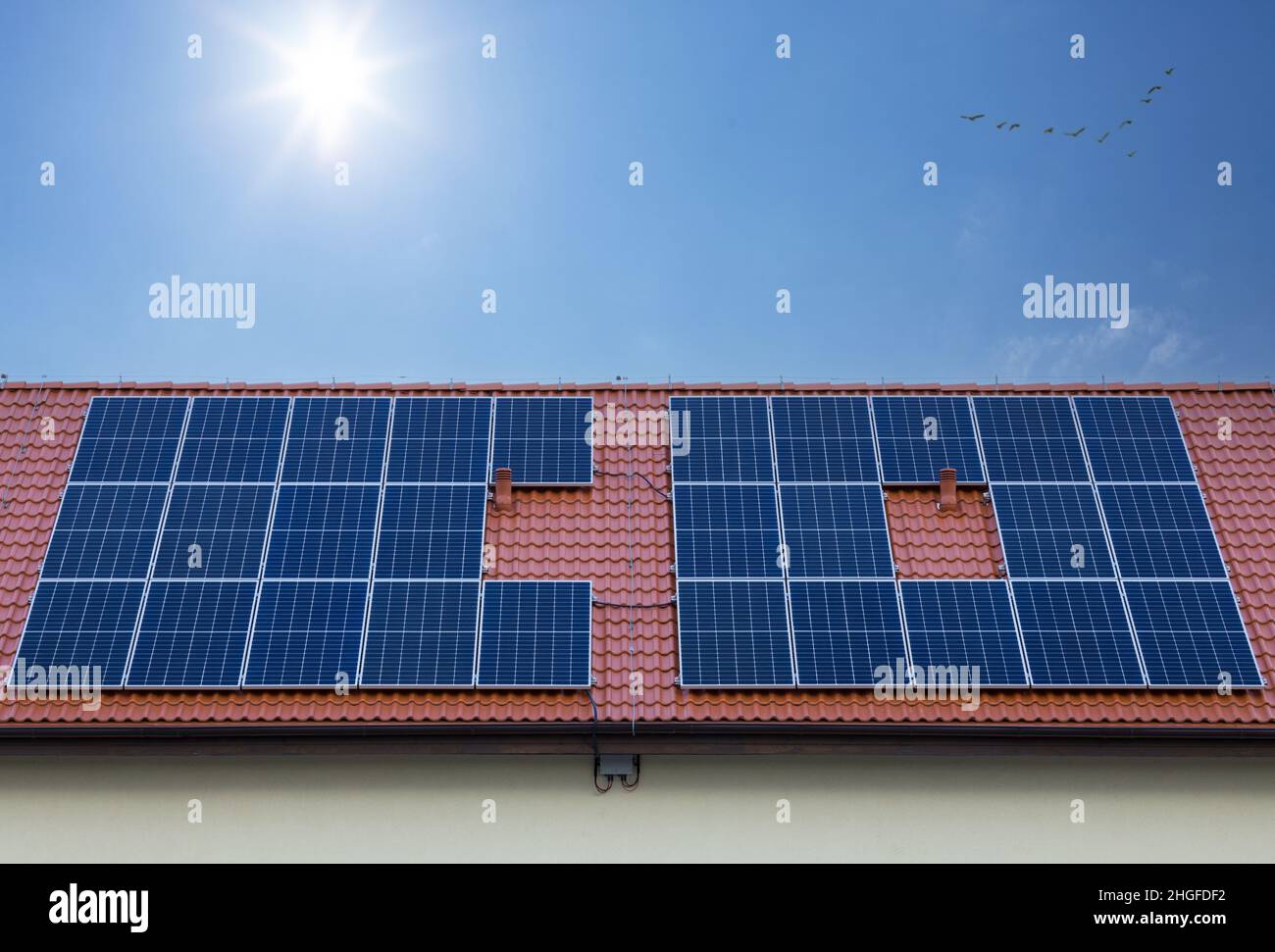 Solar panels on roof. Concept of clean air, co2. Image of concept related to ecology. Panele solrane and co2. Stock Photo