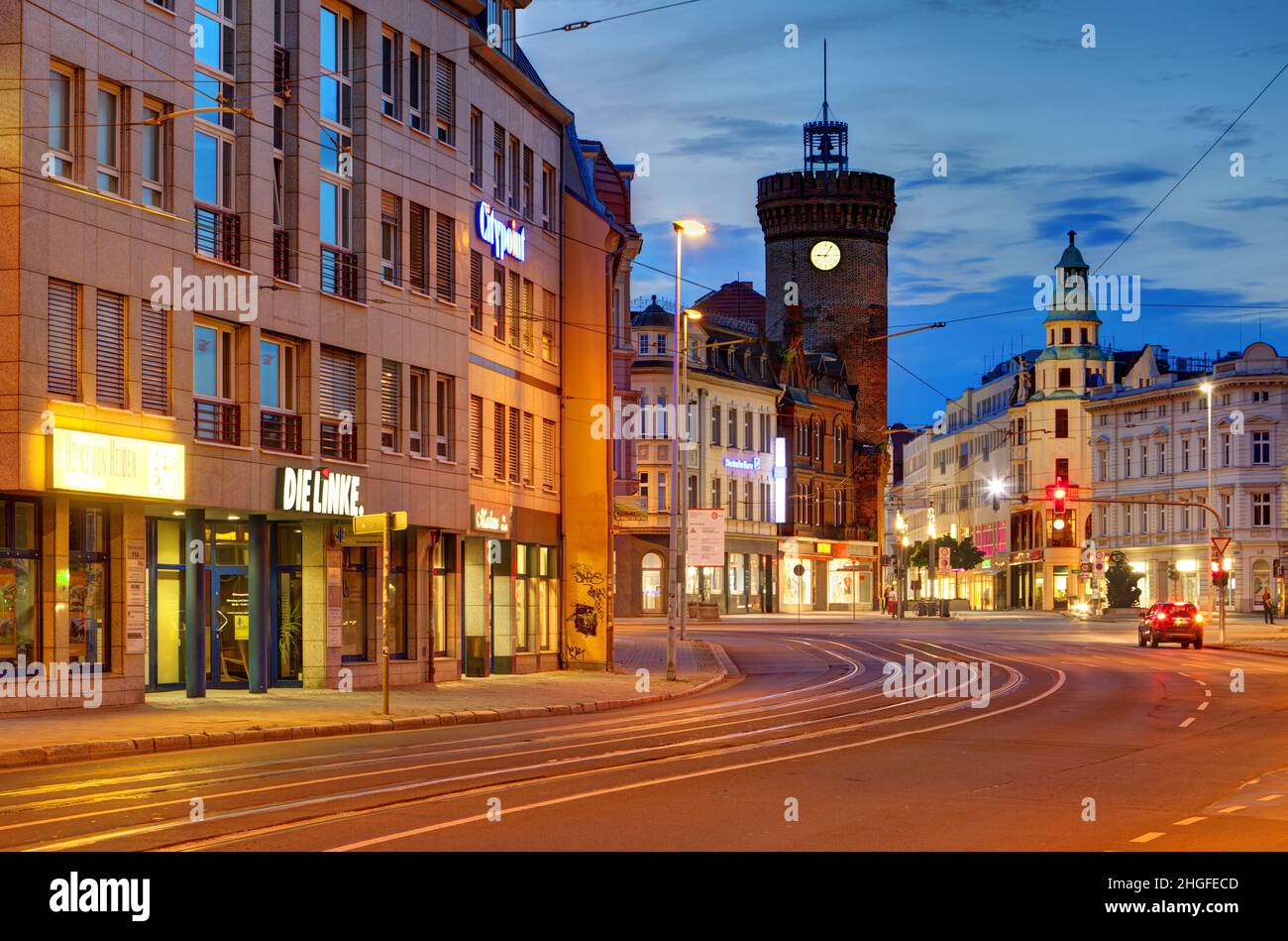Cottbus, Brandenburg, Der Jugend street and The 14th century old Spremberger Tower by night Stock Photo