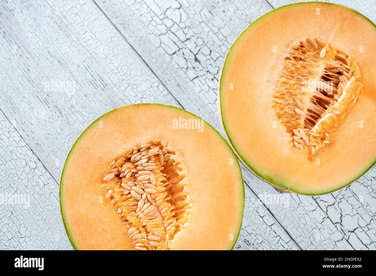 Cross section of Cantaloupe melon flat lay Stock Photo Alamy