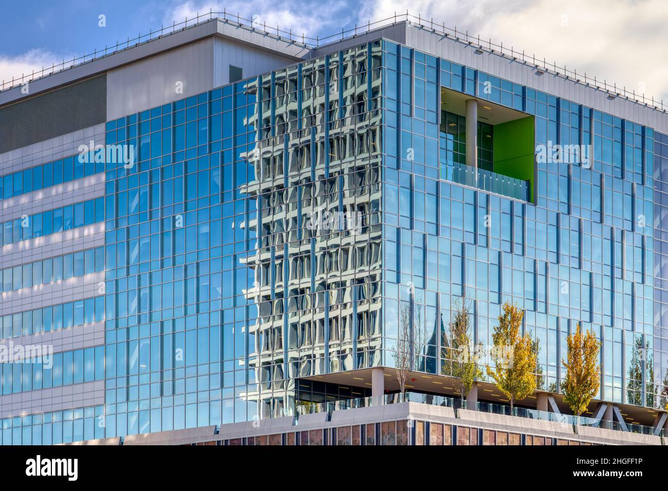 VCU Children’s Pavilion got mixed reviews but the way it reflects and fractures the sky and neighboring buildings is dynamic abstract art. Stock Photo