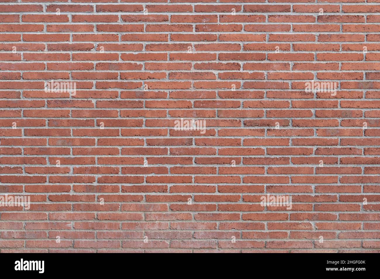 Old brown bricks dirty wall background with some imperfections Stock Photo