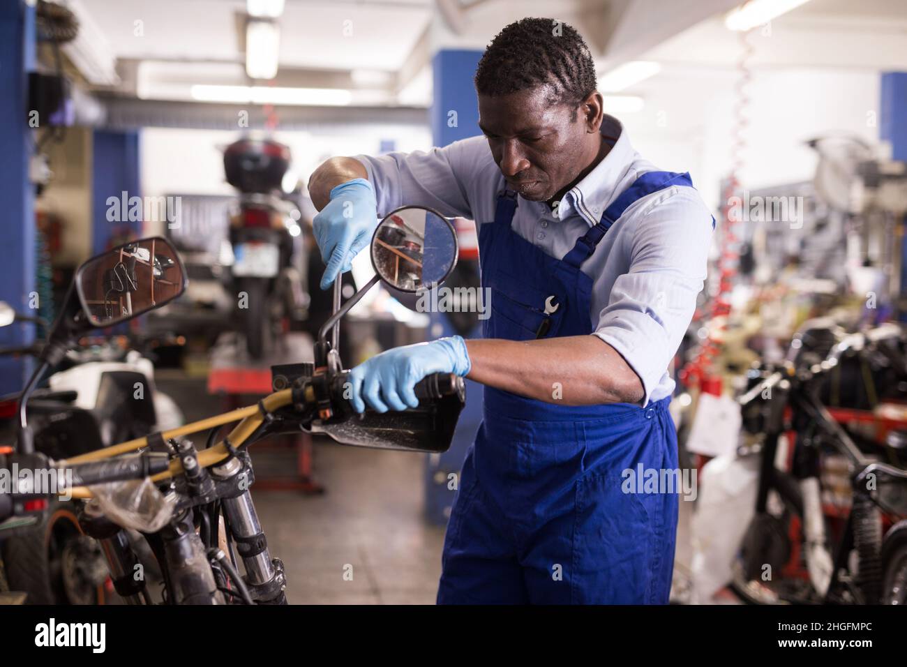 Motorcycle Service Work Technician man working motorcycle hi-res stock photography and images ...