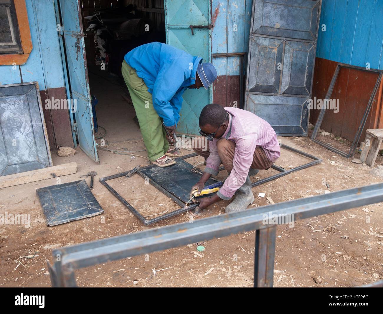 Street welding business, window frames in Kenya, Africa Stock Photo Alamy