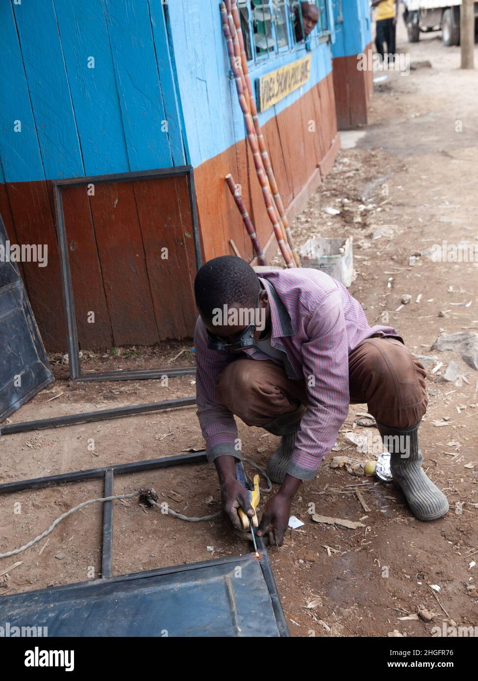 Street welding business, window frames in Kenya, Africa Stock Photo Alamy
