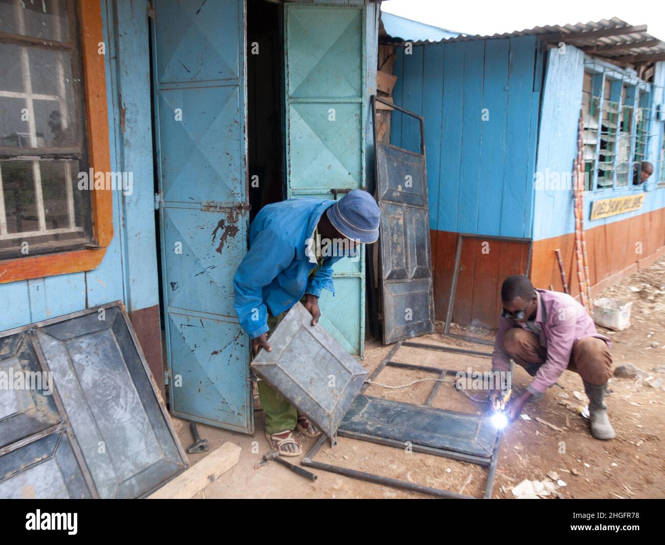 Street welding business, window frames in Kenya, Africa Stock Photo Alamy