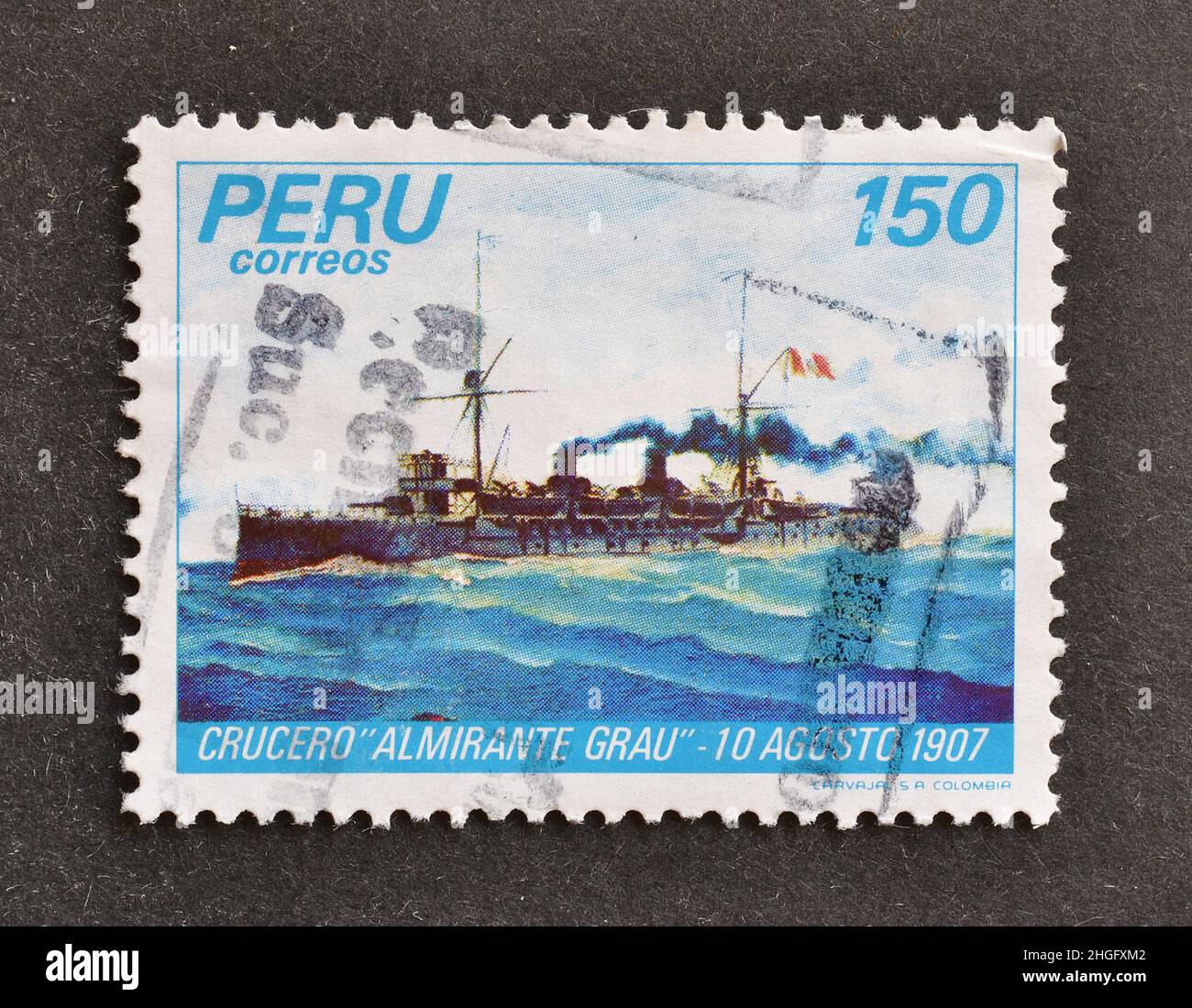 Cancelled postage stamp printed by Peru, that shows Military ship - Cruiser Almirante Grau 1907, circa 1983. Stock Photo