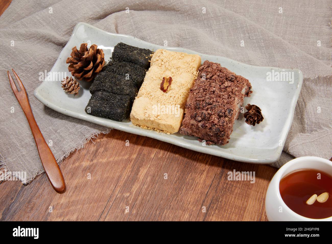 korean traditional dessert, rice cake injeolmi and jujube tea Stock