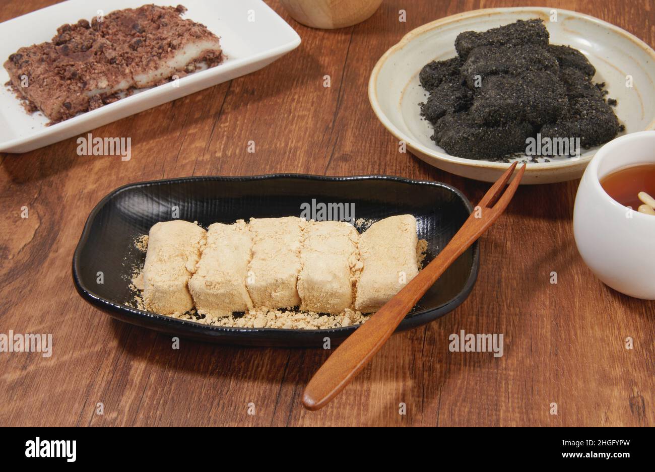 korean traditional dessert, rice cake injeolmi and jujube tea Stock
