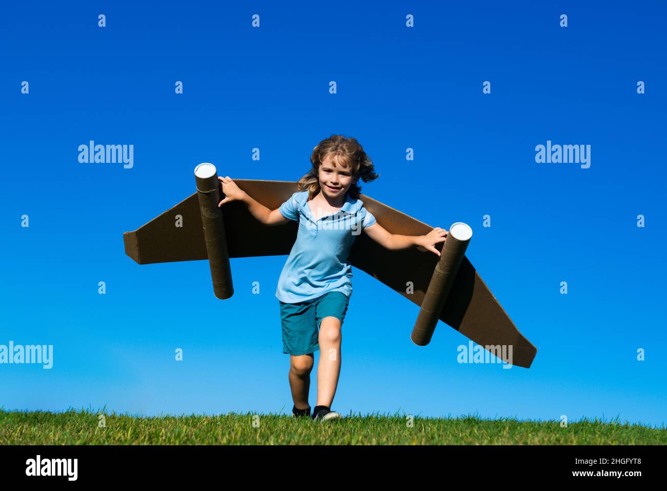 Happy boy playing toy jetpack hi-res stock photography and images - Alamy