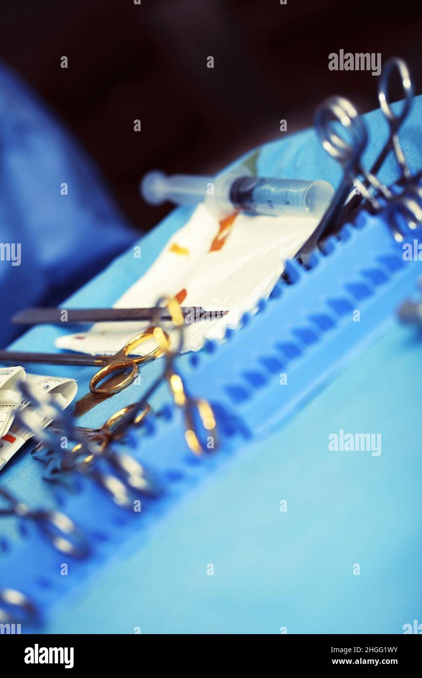 Sterile table with used surgical tools during wound dressing Stock