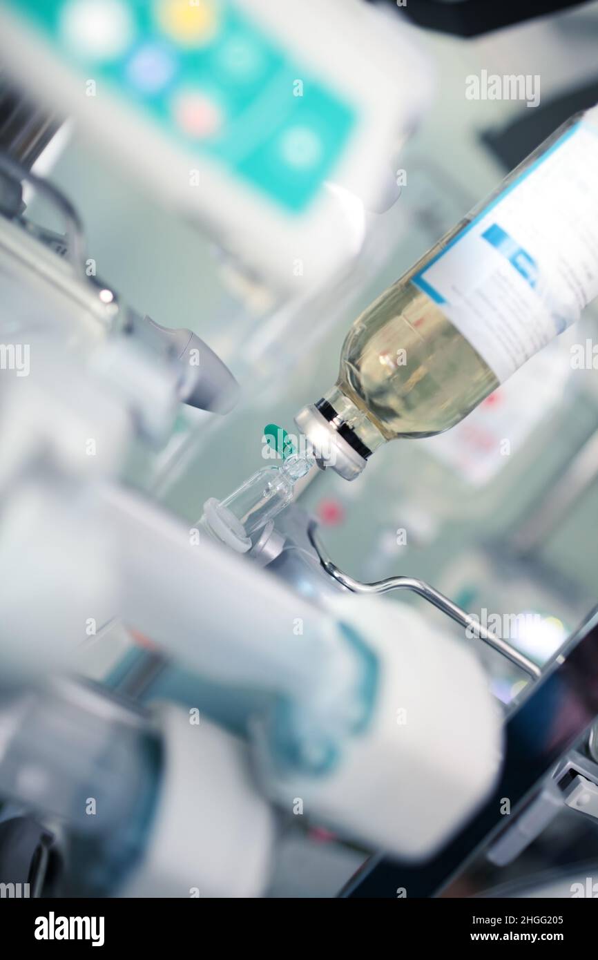 IV drip and perfusion devices in the hospital room. Stock Photo