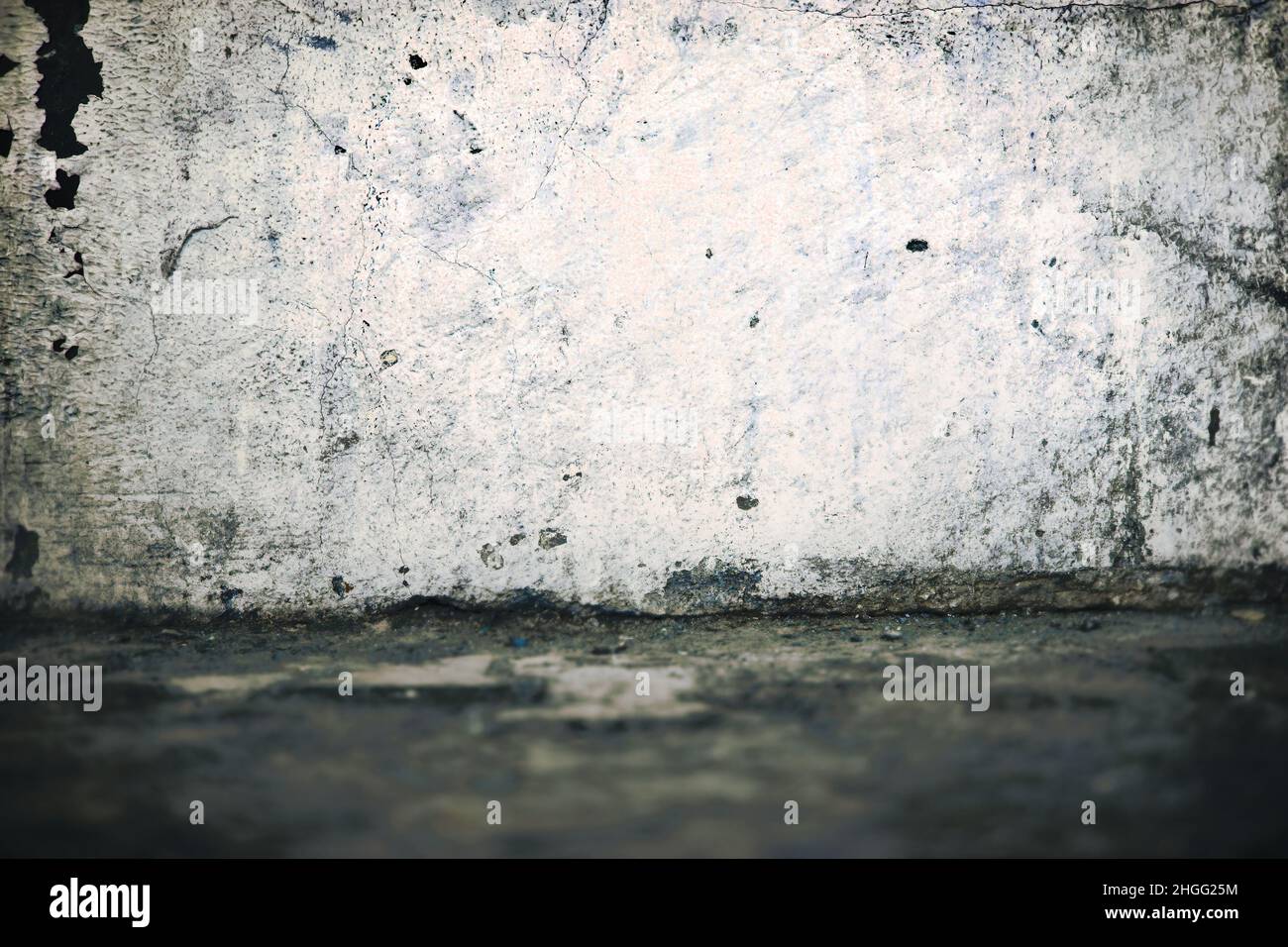 Old building wall with peeled plaster. Stock Photo