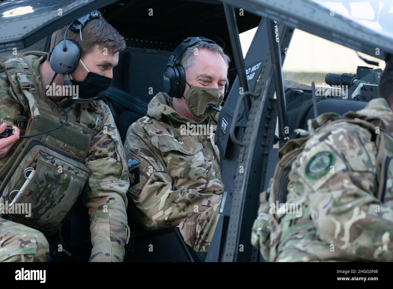 The Deputy Chief of the General Staff, Lieutenant General Sir Chris Tickell in the back seat of the army's new Apache AH-64E attack helicopter at Wattisham Flying Station, Suffolk. Picture date: Thursday January 20, 2022. Stock Photo