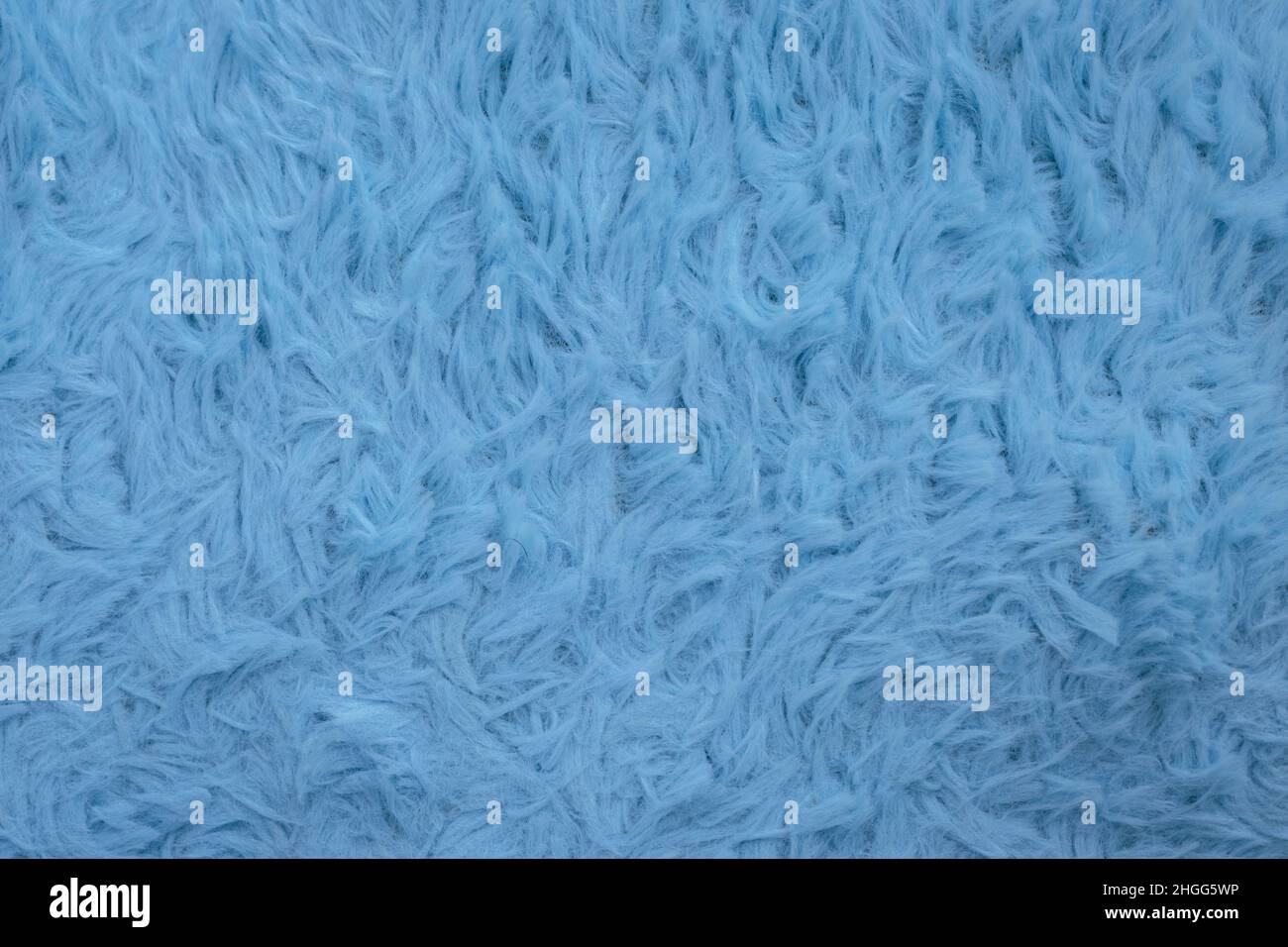 Beautiful sparkling artificial blue fur texture background Stock Photo
