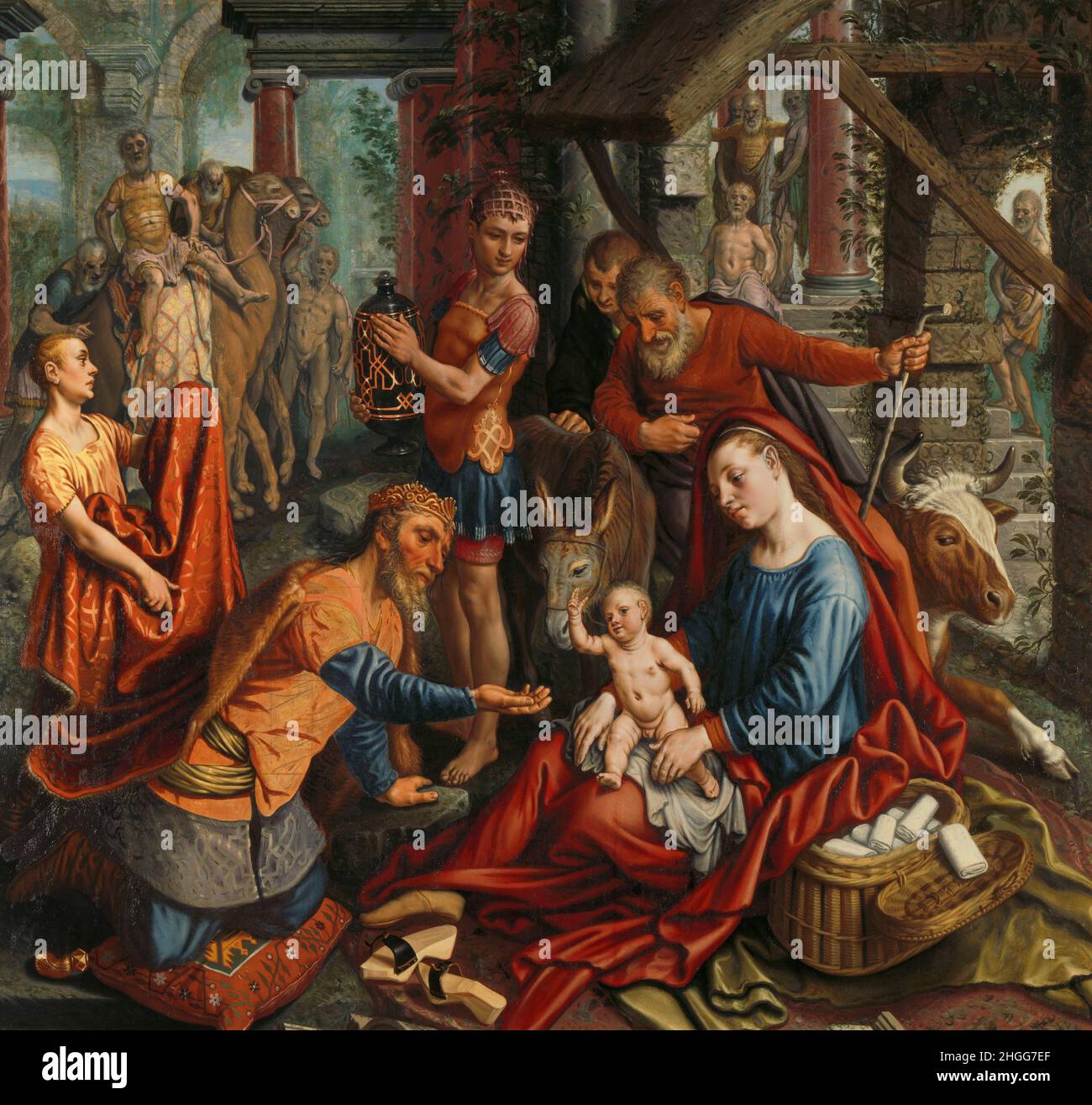 Netherlands/Middle East: 'The Adoration of the Magi'. Oil on panel painting by Pieter Aertsen (c. 1508 - 3 June 1575), 1560.  According to Christianity, the Three Kings, or Three Wise Men, travelled from the East to Bethlehem to pay homage to the newly born Messiah, the son of God. Cradled in his mother the Virgin Mary’s hands, the baby Jesus holds up his hand in a blessing. Before him kneels King Melchior, offering a gift of gold. Joseph, Mary's husband, stands behind in red. Stock Photo
