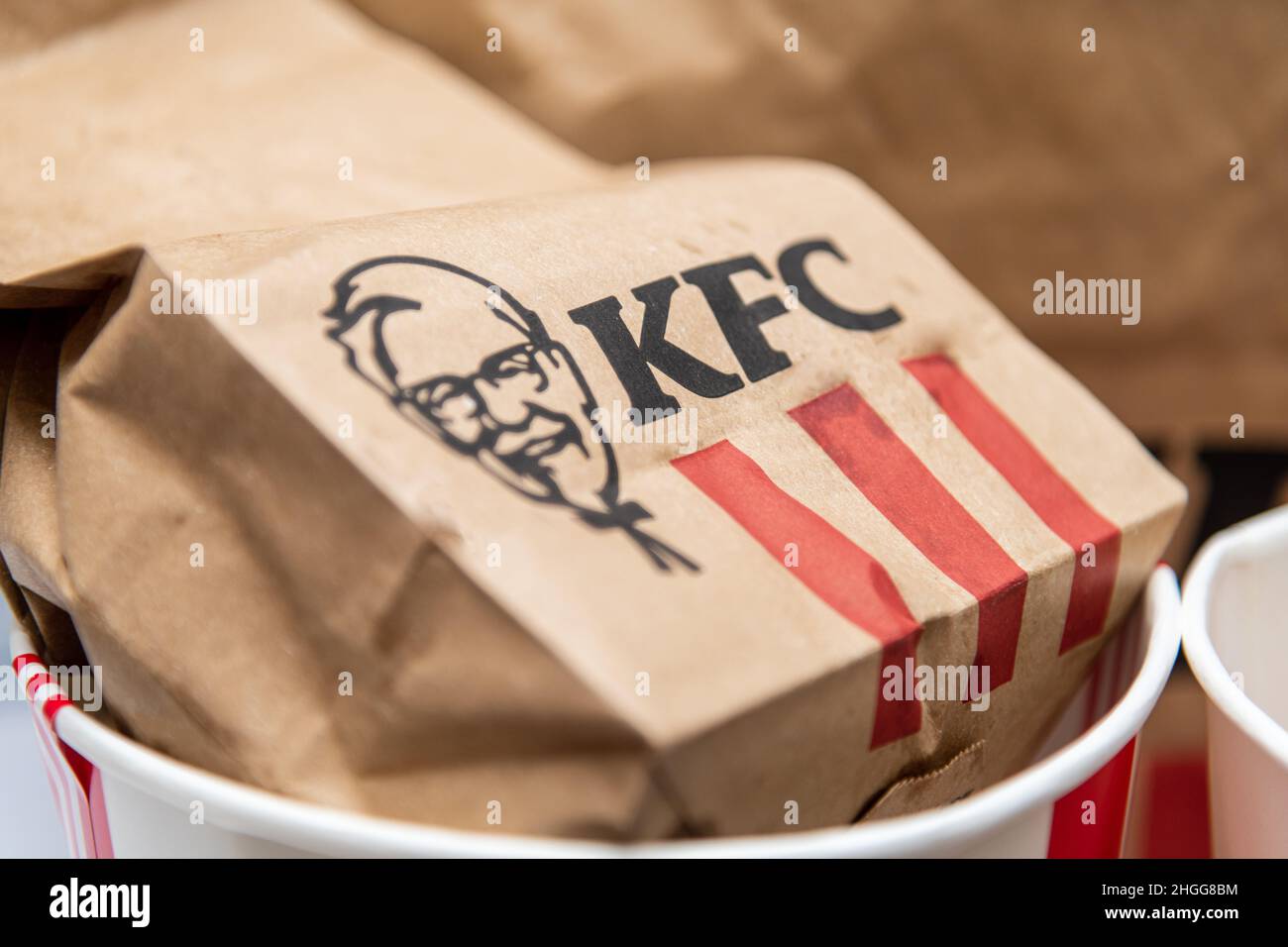 Antalya, Turkey - January 20, 2022: A lots of KFC chicken hot strips or nuggets in bucket of KFC ( Kentucky Fried Chicken ) fast food. Stock Photo