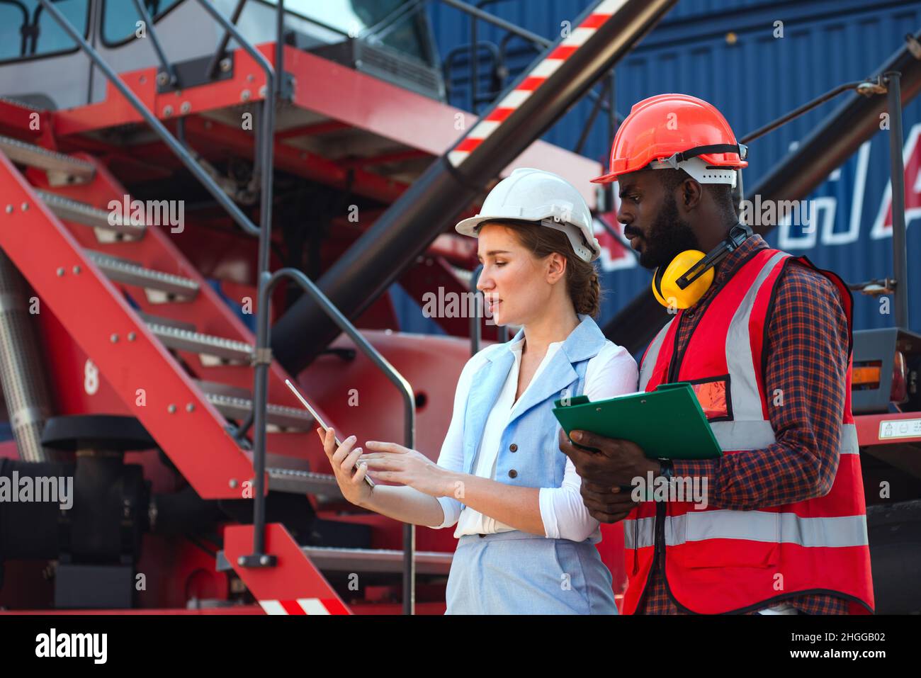 The Problem with businesswoman and engineer talking and checking