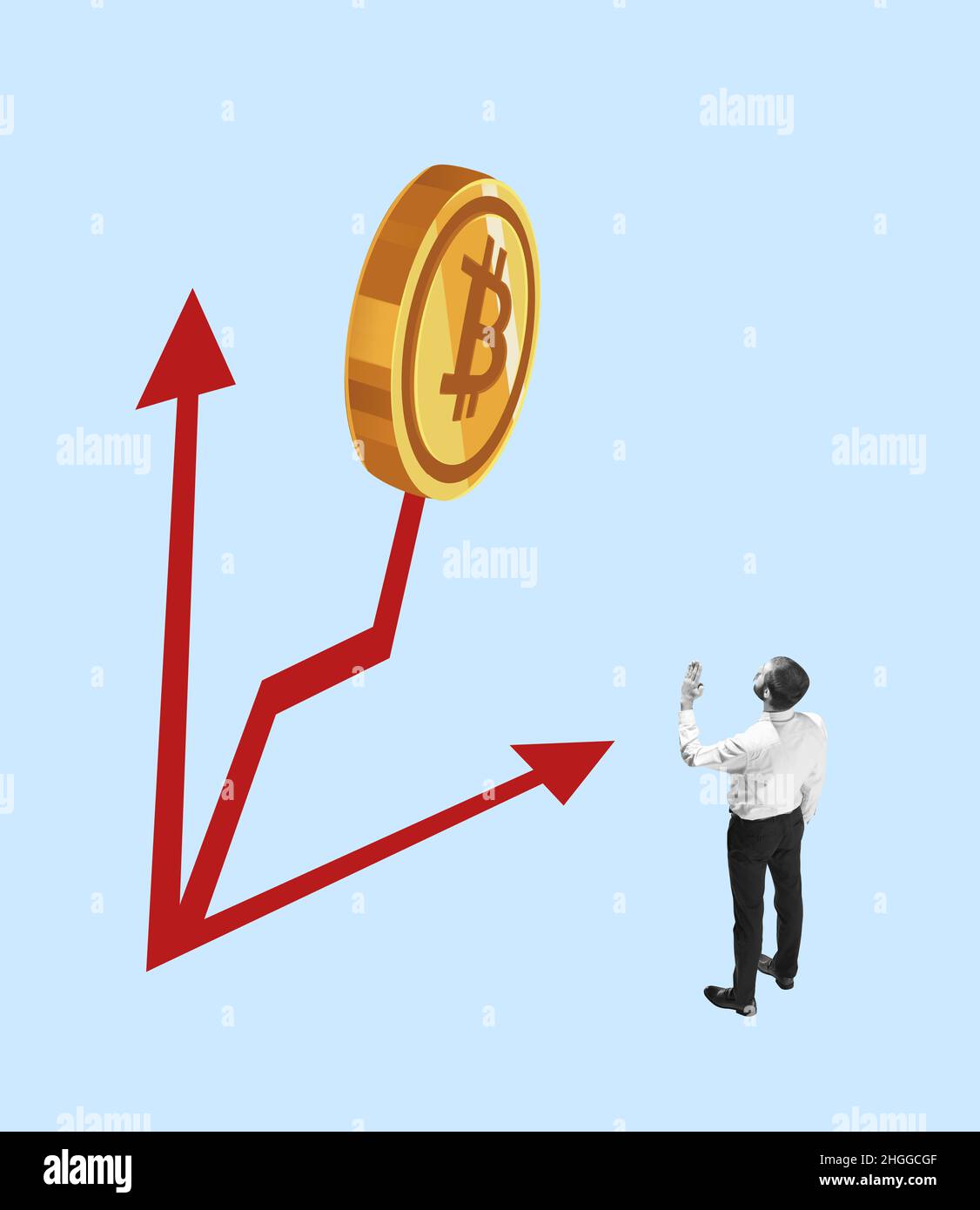 Young man, businessman standing looking at cryptocurrency growth chart. Concept of finance, economy, professional occupation, business and career. Stock Photo
