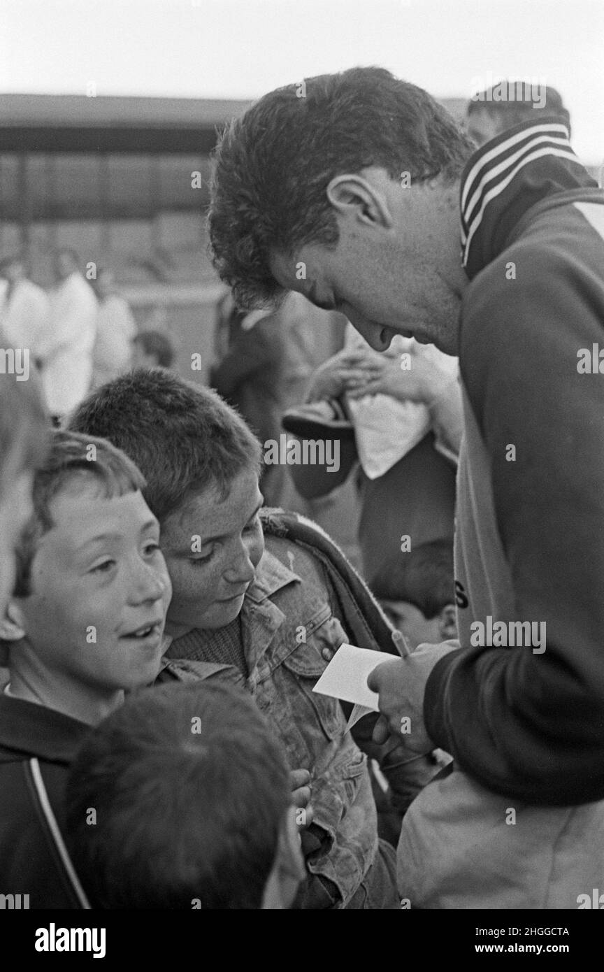 Football player signing autographs for excited kids, June 13, 1986, Dublin, Republic of Ireland Stock Photo