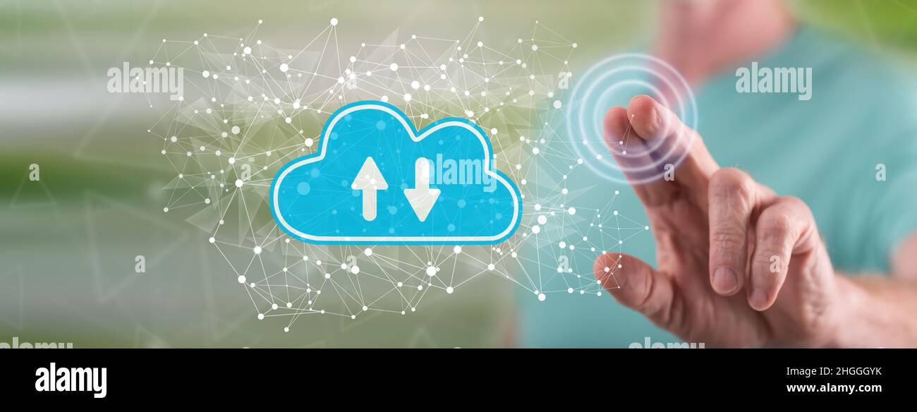 Man touching cloud storage concept on a touch screen with his finger ...