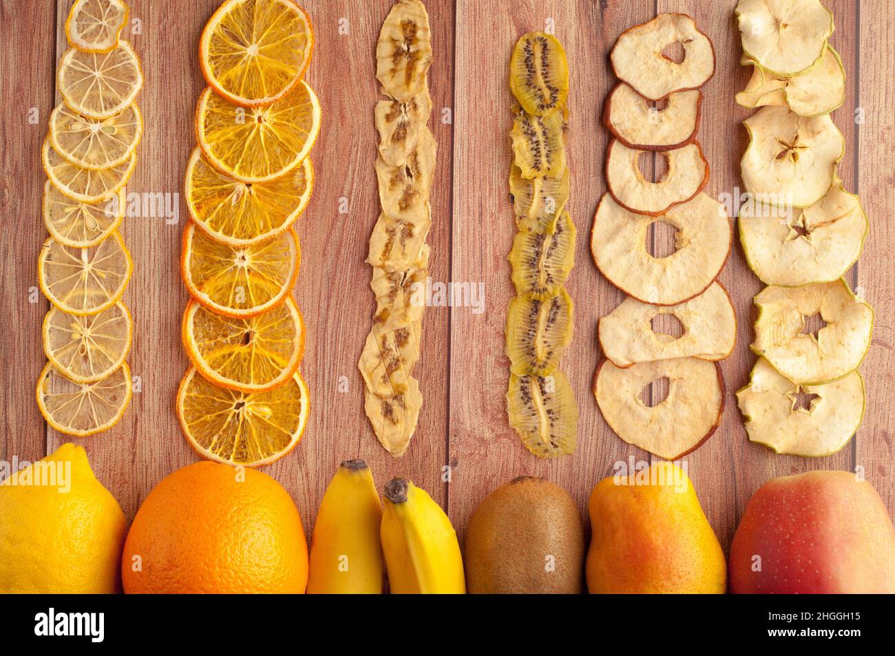 Healthy snack.Homemade dehydrated fruit chips and fresh fruits on