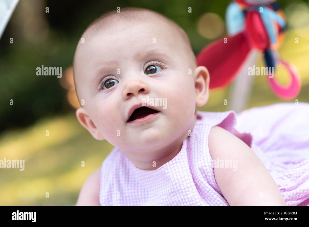 Portrait of cute baby girl, outdoors Stock Photo - Alamy